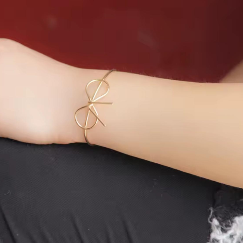 Pulsera Lazo Dorado Elegante